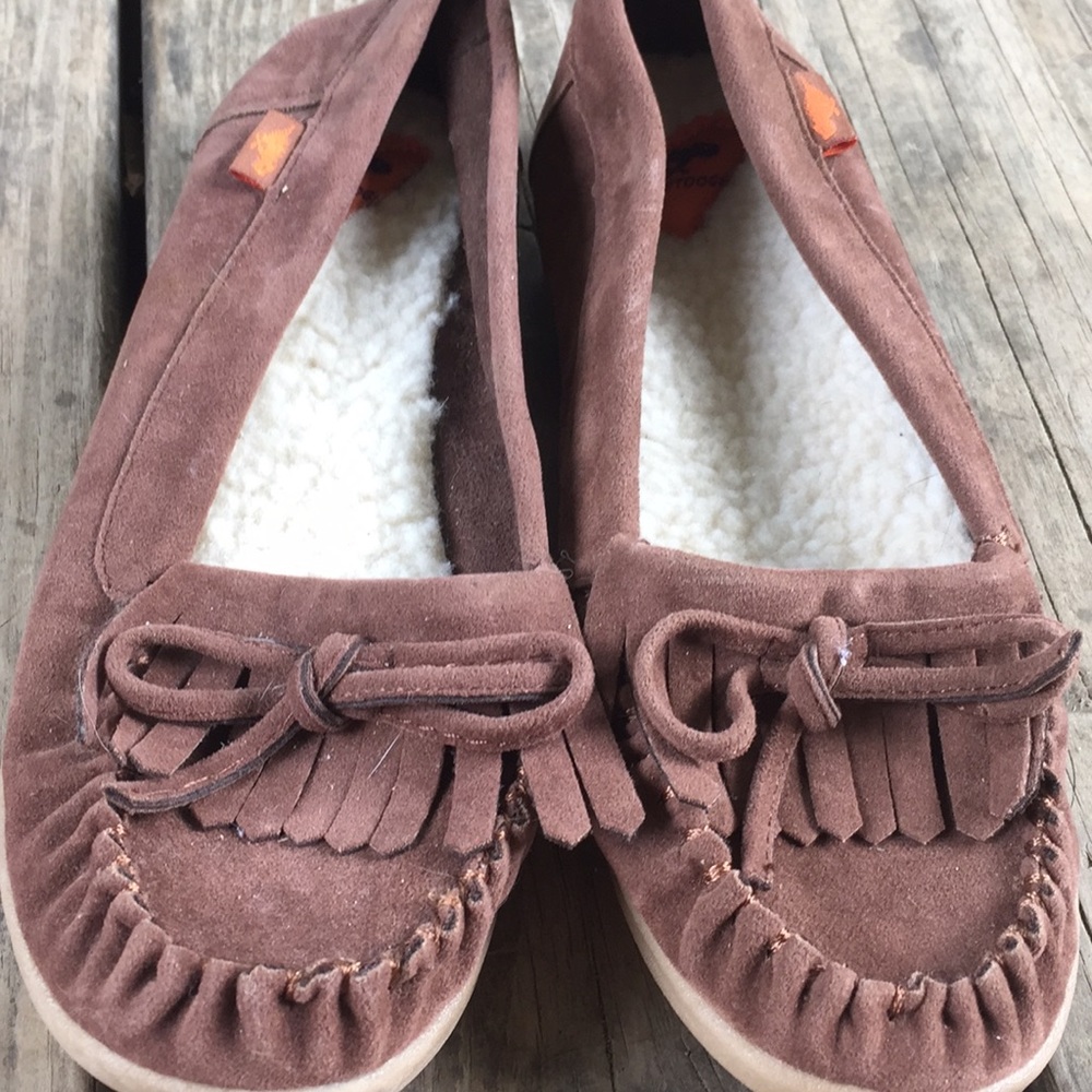 Dark brown moccasins.